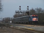 As far as my first attempt at  daylight westbound this year, this is it... Iowa 157 and a pair of GE's didn't take BICB west until after sunset, and I had to settle for a shot of Metra... 03-31-10