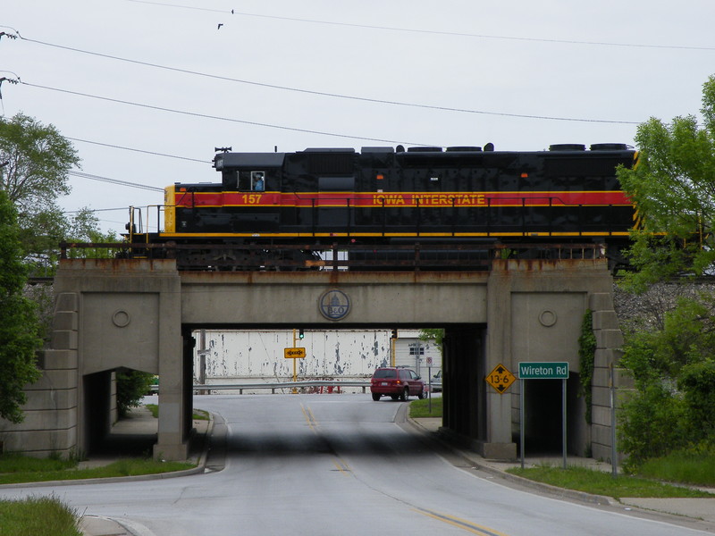 With a straight shot down track 9, Iowa 157 is taking head room on Harbor main 2 at C.P. Francisco. The bridge still shows off its B&O heritage. 05-18-10