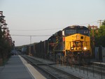 Iowa 511 and 711 double team a 108 car BICB through the long shadows in Tinley Park, unfortunetaly, they held this guy until Metra 523 cleared BI at 19:30... passing Tinley at 20:00. 06-24-10