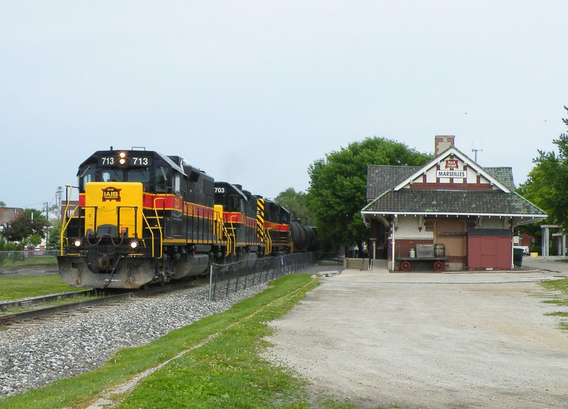 The crew has a good roll on em' as an extra RIBI rocks and rolls down CSX's unmaintained New Rock Sub at Marseilles.