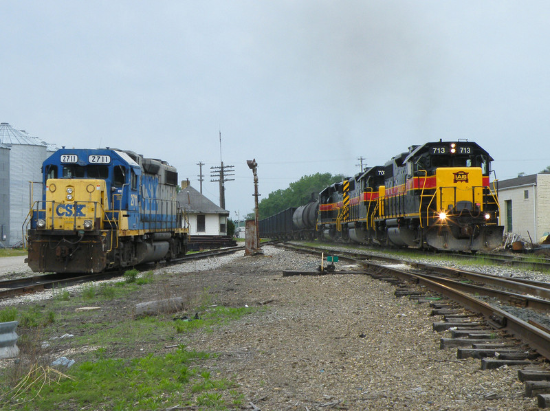 An extra RIBI running as CSXT foreign train Z026 14 thunders out of the siding at Seneca with a new crew and blocks to Rockdale. Iowa 713, 703, and 156 do the honors with huge blocks of sand for Hickory Creek and a cut of stacks for Burr Oak.