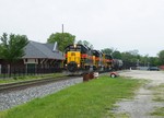 The cloudy skies opened the door to try a new angle at Morris as the Z026 14 rolls east by the restored RI Depot.