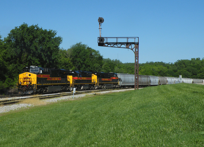 Taking headroom down the west wye, Iowa's big power rolls past the vintage Rock signals still standing in Bureau.