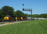 Taking headroom down the west wye, Iowa's big power rolls past the vintage Rock signals still standing in Bureau.