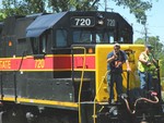 Conductors Vahey and Brown put on a hardass face as they ride 720 down the Buzzi spur.