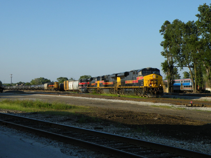 Iowa 511 is set to lead a lengthy BICB out of Burr Oak on this beautiful summer evening. The power tonight is four big GE's. Over on the left is a nifty little EMD consist for a BIRI type train later that evening. 07-16-10