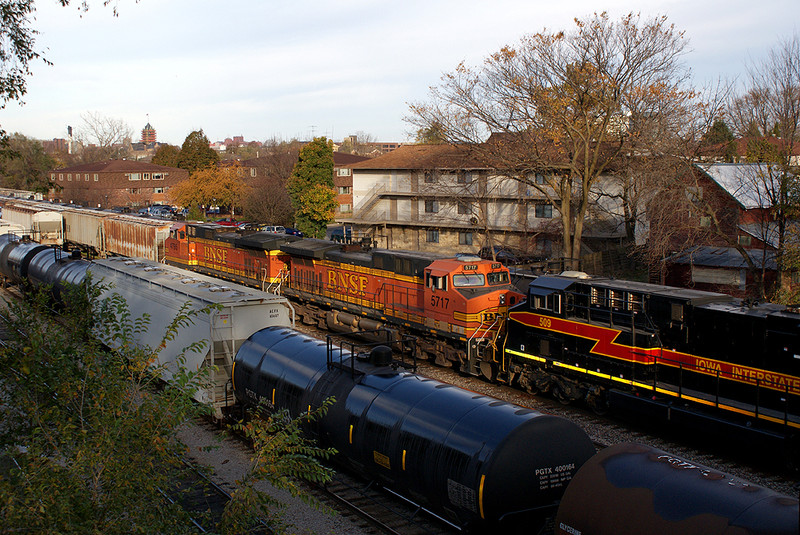 A pair of BNSF Dash9's on the CBBI passing through the Iowa City Yard.