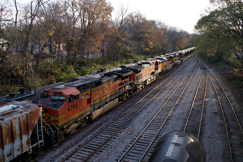 A pair of BNSF Dash9's on the CBBI passing through the Iowa City Yard.