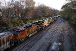 A pair of BNSF Dash9's on the CBBI passing through the Iowa City Yard.