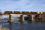 The BICB crosses the Iowa River with a pair of GP's up front.