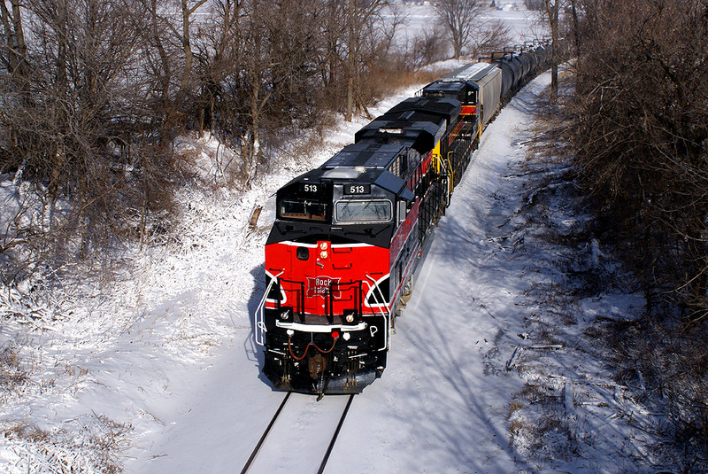 513 leads 9300 feet of train under the Iowa/Benton Bridge.