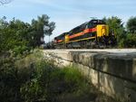 A slightly different take from standing on an old Rock spur that declined to street level here, we see Iowa 157 forwarding onto Metra territory at Bridge 407.