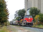 Screaming east in a slight drizzle, the Rock unit is all glinty bouncing down the welded rail in Minooka.