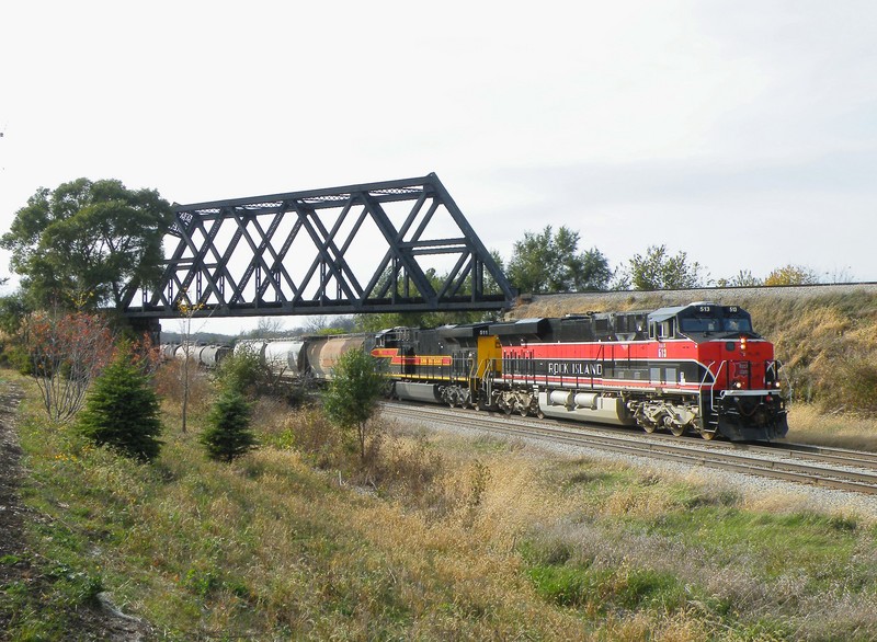 Thundering out of Joliet, the two GEVO's are screaming as they cruise under the old Wabash bridge in New Lenox.