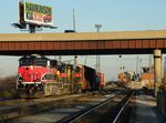 513 looks good in the late evening light as they yard a huge cut of cars off of CBBI in IHB's Riverdale Yd. IHB's Hump is off to the right, and a SW1500/Slug set is pulling a cut of cars down to start distributing them amongst the yard. 11-23-10