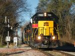 Iowa 703 leads the 154 and 506 on an extra grain train for Newton, bound for Peoria and the TZPR. The train is just clear of Colona, passing the old Rock tri-color in the small town of Green River, IL.