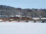 Skirting across a creek outside of Bureau, the pair of SD38-2's have their hands full, grinding out of the Bureau river valley, its going to be a slow trip!