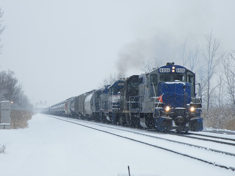 The RailLink is pulling down past 119th St on the Rock main to double up their train, before they leave they will have over 160 loads, mainly ethanol! Power is OSSX GP7 4438, CRl SW14 1460, CKRY GP9u 903, and OSSX GP7 4297. 12-04-10