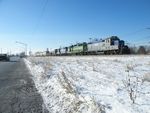 Pulling up to complete their airtest at 111th St., todays train from the Iowa is another giant 160+ car monster. With a nice rainbow lash-up to boot! 12-15-10