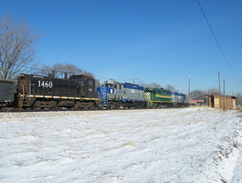 Another rainbow consist pulls up next to the abandoned Rock Island depot at 111th St to air test. 12-15-10.