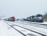 The RailLink builds their outbound train in BI, Iowa's caboose sits over at the east end of Burr Oak Yd. 12-24-10