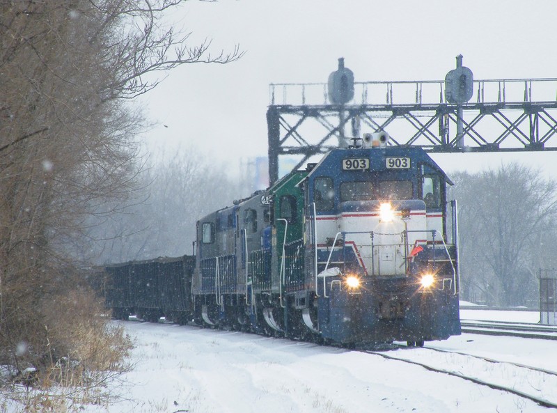 Passing through Abbot Park, the old NKP is to the right as can be seen by the huge tro-color sigs. Farther over to the right is the BRC main to their South Chicago Yard, where this train is headed! 12-24-10.