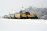 The CIC pulls a cut of loaded hoppers into the 900 yard from UP's Fairfax Yard.