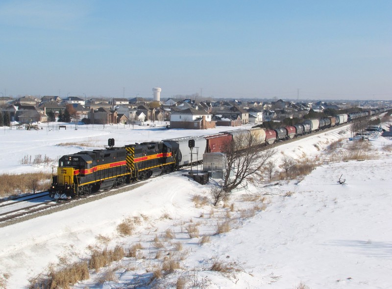 As viewed from I-80, 703 and 708 are charging west out of Tinley Park, IL. I bet this view has changed quite a bit over the years!