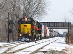 Passing under the old Joliet Junction, Iowa 703 west will cross over and take the industrial siding around Iowa 154 east,