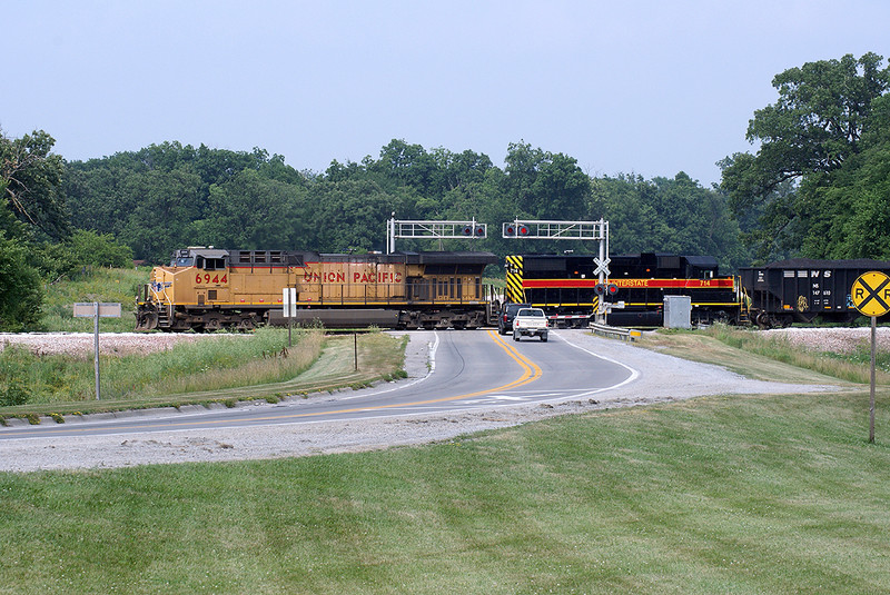 UP 6944 at Highway 6 crossing.