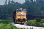 UP 6944 rounding the curve at Kent Park