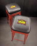 I wanted a couple 30 inch stools for operators to sit on to relax during operating sessions. I bought red metal stools that looked weathered, had the IAIS logo embroidered on black leather and an upholsterer made the two cushioned seats.