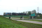 QJ 7081 East crosses Interstate 280 at Davenport, Iowa September 9th, 2006.