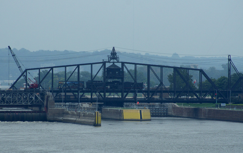 Just in from Iowa City, QJ 7081 crosses the Mississippi into Rock Island where she will join the 6988 and wait for the Riverway 2006 excursion weekend. Date is September 9th, 2006.