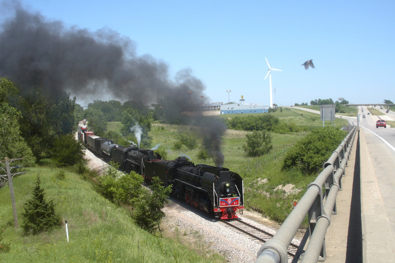 Three ways to fly. Chinese steam, cruising on I-80 or being a pheasant. Photo at Adair, Iowa.