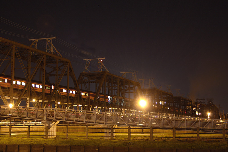 The QJs return to Rock Island from the trip out to Walcott. The steamers can be seen entering the Government Bridge's swing span. September 14th, 2006.