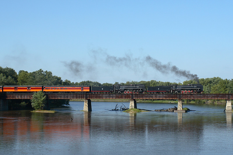 The QJs cross the Cedar River eastbound at Moscow.