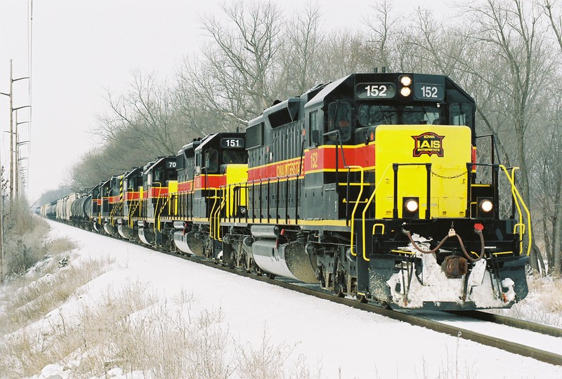 152 leads a strirng of six locos on the 3rd sub a mile east of Tiffin, Iowa on January 30, 2007.