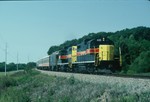 GP's 402 and 405 lead the Ag Expo east of Oxford Iowa on the way to the Farm Progress show held in Main Amana September 8, 1988.