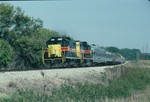GP's 402 and 405 lead the Ag Expo east of Oxford Iowa on the way to the Farm Progress show held in Main Amana September 8, 1988.