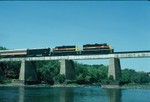 GP's 402 and 405 lead the Ag Expo east of Oxford Iowa on the way to the Farm Progress show held in Main Amana September 8, 1988.