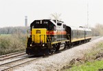 On its way to Newton, the IAIS Business Train approaches Homestead, Iowa on 30-April-08.