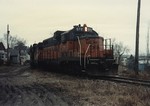 Milwaukee GP-20's 972 and 973 push a string of cars down the hill track to the Crandic.