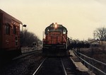 Milwaukee GP-20's 972 and 973 push a string of cars down the hill track to the Crandic.