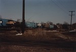 A string of RI cars head east through Iowa City on their last trip home.