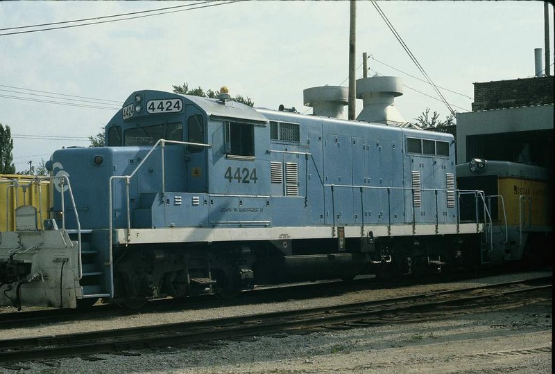 Ex-Rock 4424 at Chrome in Silvis before coming to the IAIS on a short term lease. Note Crandic #95 SW in the shop.