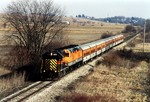 After a stop at Yocum to turn 625, the Ski Train passes under the Highway 6 bridge west of Ladora, Iowa.