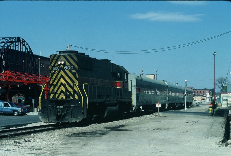 Downtown Des Moines finds 600 running long hood forward waiting to head back to Iowa City. April-1990.