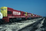 The only six axle GE's owned by the Rock Island await their fate at Silvis in this 26-March-1989 photo. What a surprise to find them, but sad to see their condition.