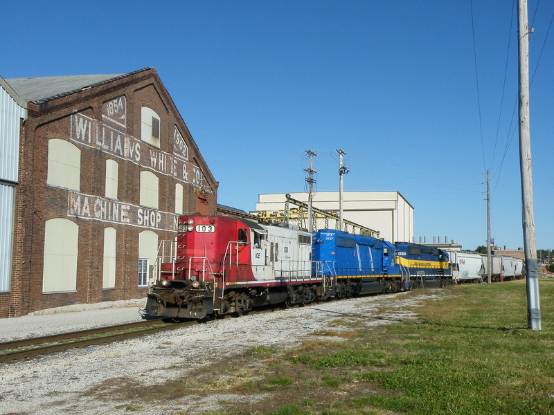 Coming into Rock Island, CP B73 passes the old Machine Shop building. 09-30-10